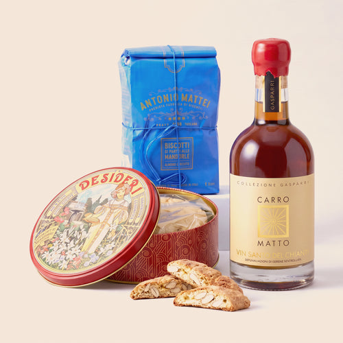Composizione Golosi per tradizione — cialde di Montecatini in latta rossa, cantucci di Prato Antonio Mattei e Vin Santo del Chianti